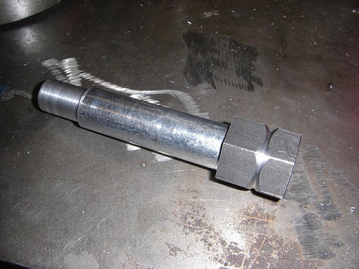 Upper steering shaft grooved and turned